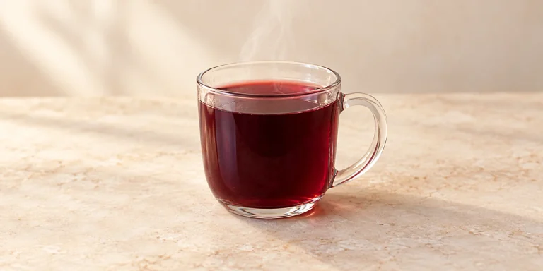Simmered Elderberry with Ginger, Honey and Lemon